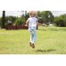Picture of Grass, Pants, Child, Female, Girl, Person, Lawn, Jumping, Walking, Park