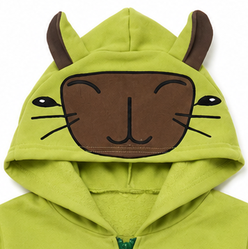 Close-up of green children's hoodie with capybara face appliqu&eacute; and ears on the hood