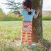 Picture of Tree, Child, Female, Girl, Person, Grass, Tree Trunk, Hiding