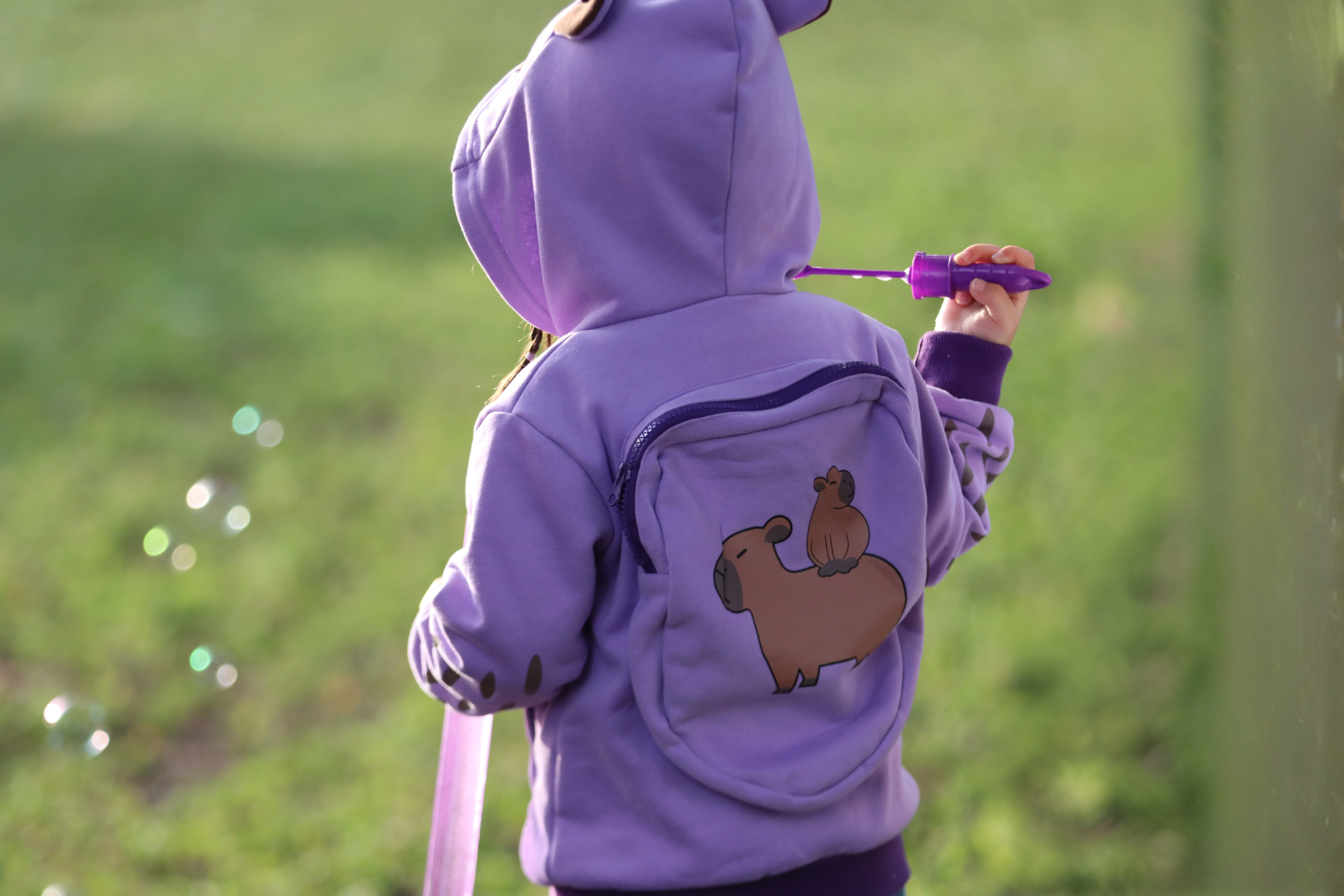 Image of LAVENDER SKY The Dreamy One Capybara Backpack Hoodie