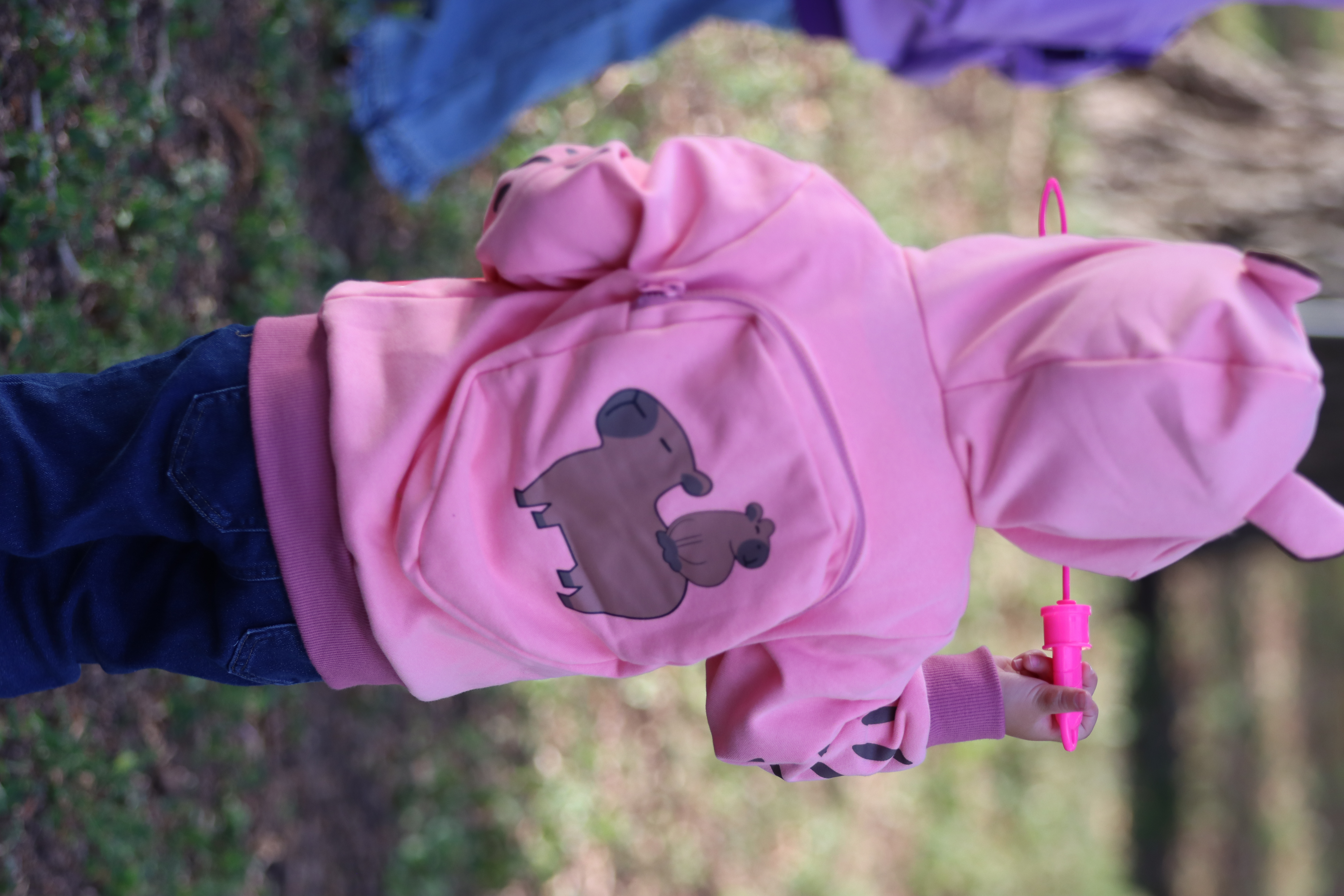 Image of ROSEWATER The Cozy One Capybara Backpack Hoodie