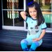 Picture of Sleeve, T-Shirt, Child, Female, Girl, Person, Head, Face, Sitting, Portrait