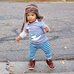 Picture of Hat, Child, Female, Girl, Person, Shoe, Pants, Cap, Portrait, Walking