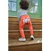 Picture of Pants, Child, Female, Girl, Person, Shoe, Wood with text JOY.
