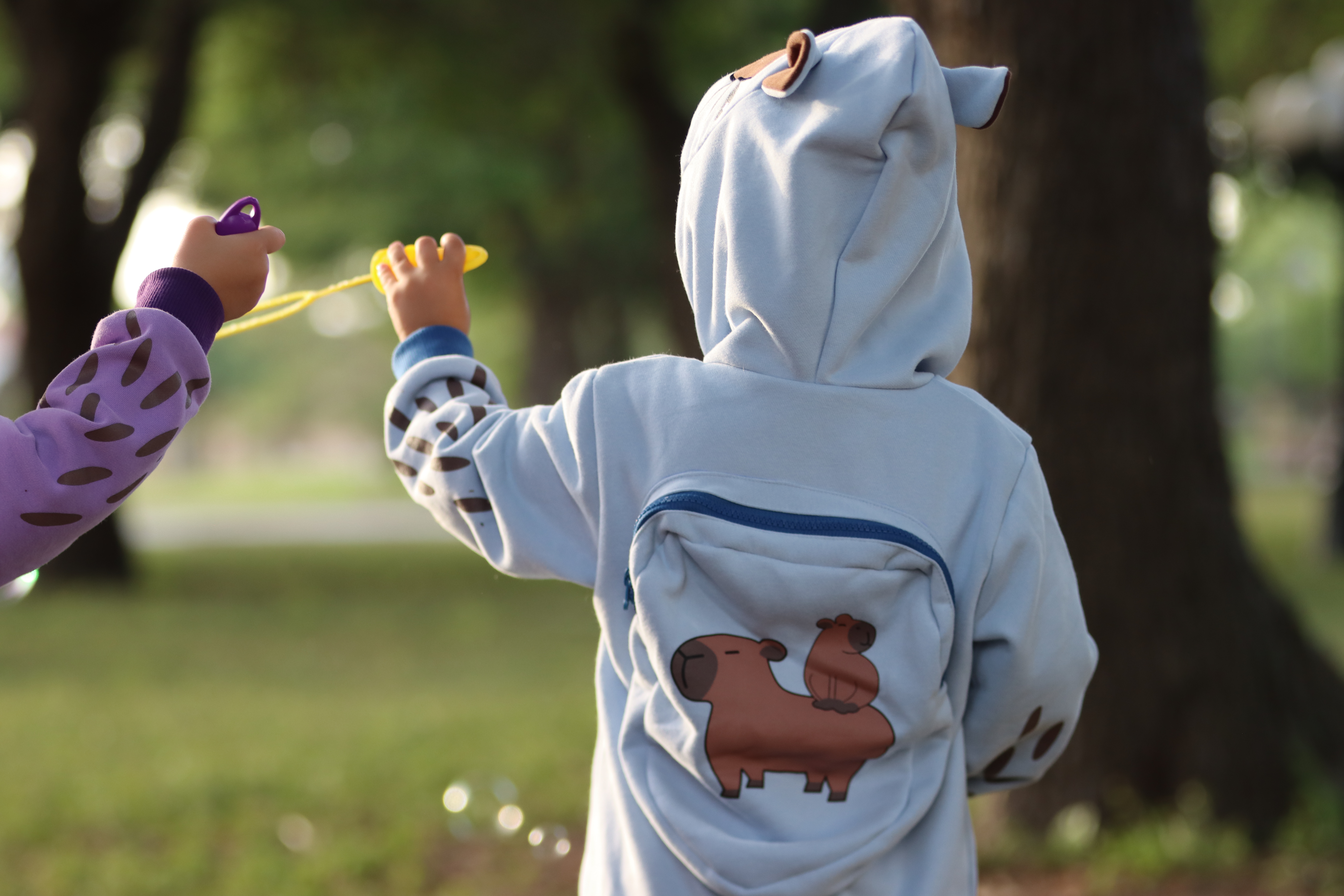 Image of COOL DIP The Splashy One Capybara Backpack Hoodie