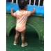 Picture of Shorts, T-Shirt, Baby, Person, Sleeve, Play Area, Shoe, Outdoors, Photography, Portrait