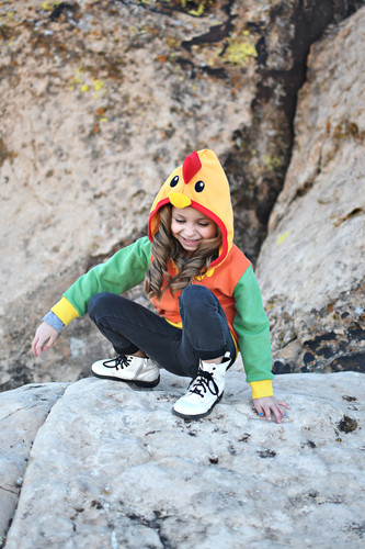 Child laughing in the hoodie