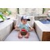 Picture of Baseball Cap, Cap, Hat, Person, Sitting, Cushion, Baby, People, Portrait, Couch
