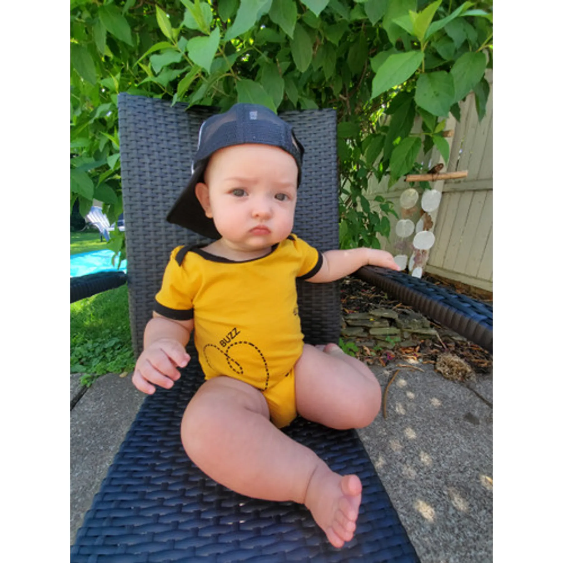 Back of Buzz the Bee bodysuit outdoors