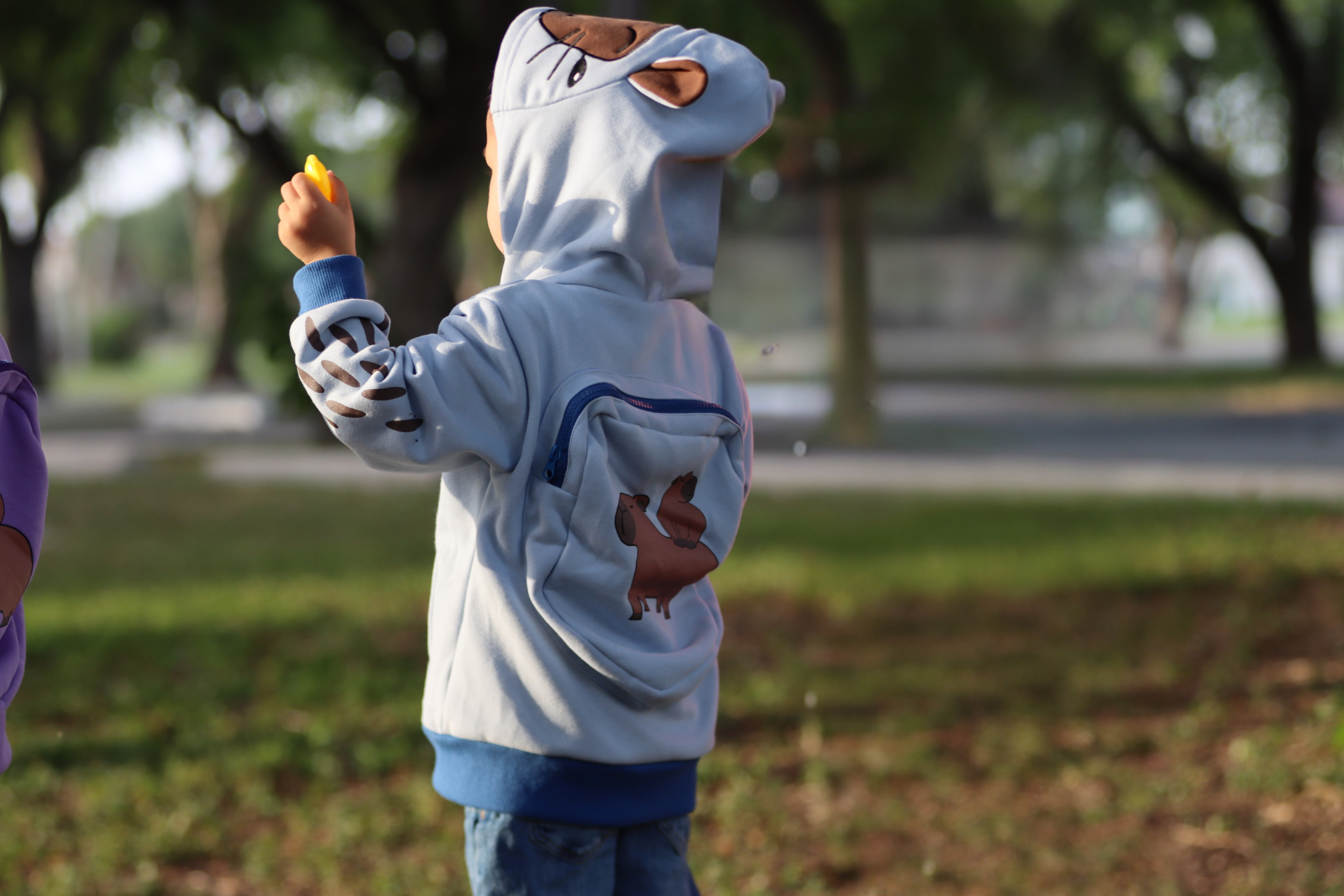 Image of COOL DIP The Splashy One Capybara Backpack Hoodie