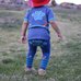 Picture of T-Shirt, Grass, Hat, Shorts, Photography, Baby, Person, Pants, Portrait, Helmet