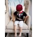 Picture of Cap, Hat, Boy, Child, Male, Person, Furniture, Sitting, Shorts, Chair
