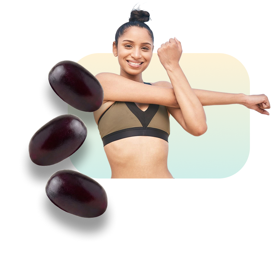 Woman stretching arm during exercise with green supplement gummies