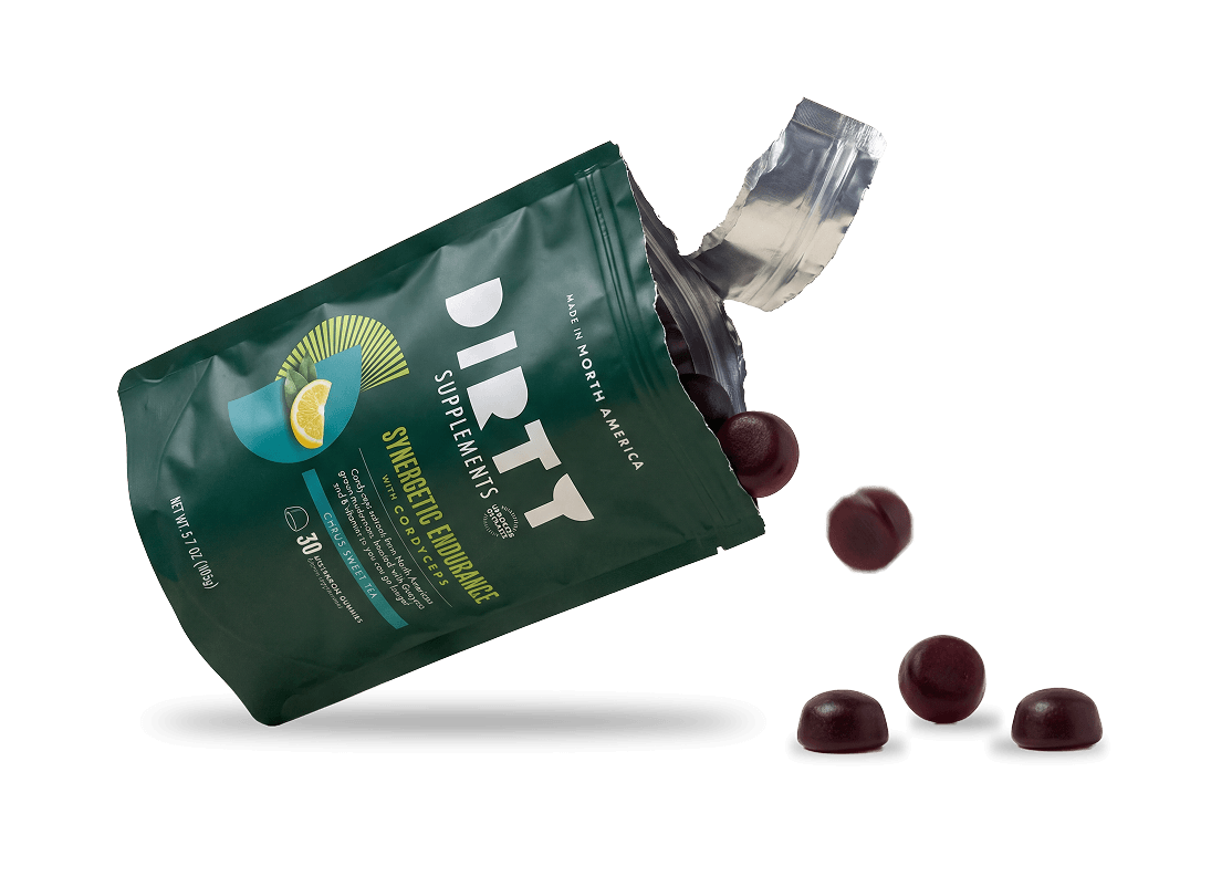 Dirty Supplements Synergetic Endurance with Cordyceps Citrus Sweet Tea open pouch with mushroom gummies spilling out