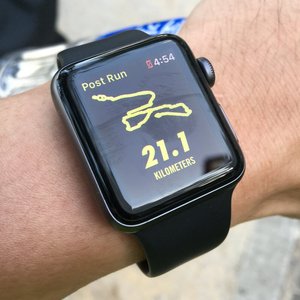 Picture of Wristwatch, Digital Watch, Person, Human with text Post Run 4:54 21.1 KILOMETERS Post Run...