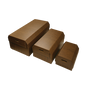 A showing of three sizes of cardboard cremation boxes sized for small children from small, medium and large. There are handholds cut out of each end and a lid on the boxes. There is a printed exterior featuring a dark brown woodgrain design.