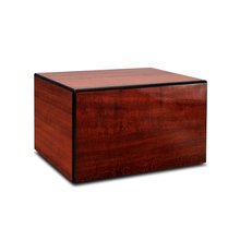 Cherry wood cremation box with darkened edges shaped in a rectangle