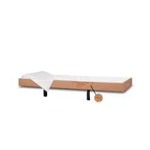 Chaise bed viewer wood-based insert with corrugated fiberboard reinforcement and white interior.