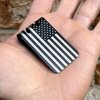 mini-VIPER Titanium Money Clip with precision engraved American flag. We designed this money clip to fully utilize titanium's strength, toughness and extreme resistance to fatigue.  Features or rugged black diamond finish for extra durability.